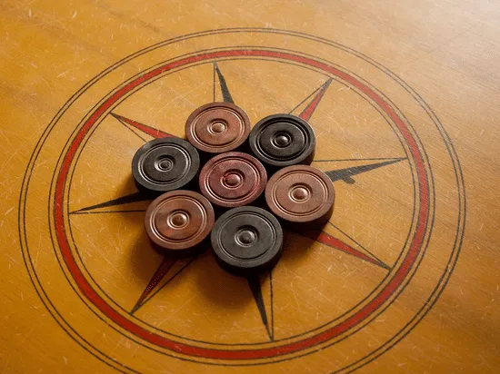 Carrom indoor game at Ensober Hotels